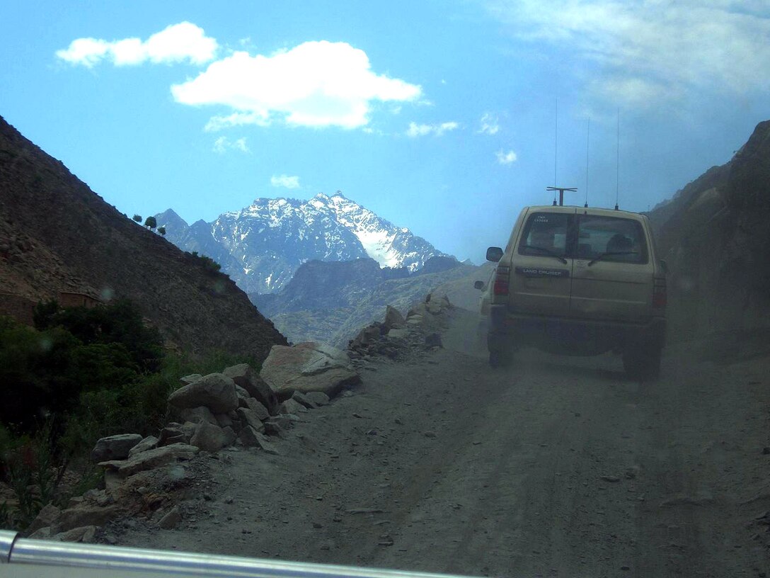 A multi-service supply convoy loaded with humanitarian assistance supplies makes its way up a narrow road in the Panjshir Province, Afghanistan, on Monday, June 12. The convoy delivered the supplies to the village of Dara, located at approximately 8,000 feet above sea level. (Courtesy photo/Marine Col. Steve Hasty)