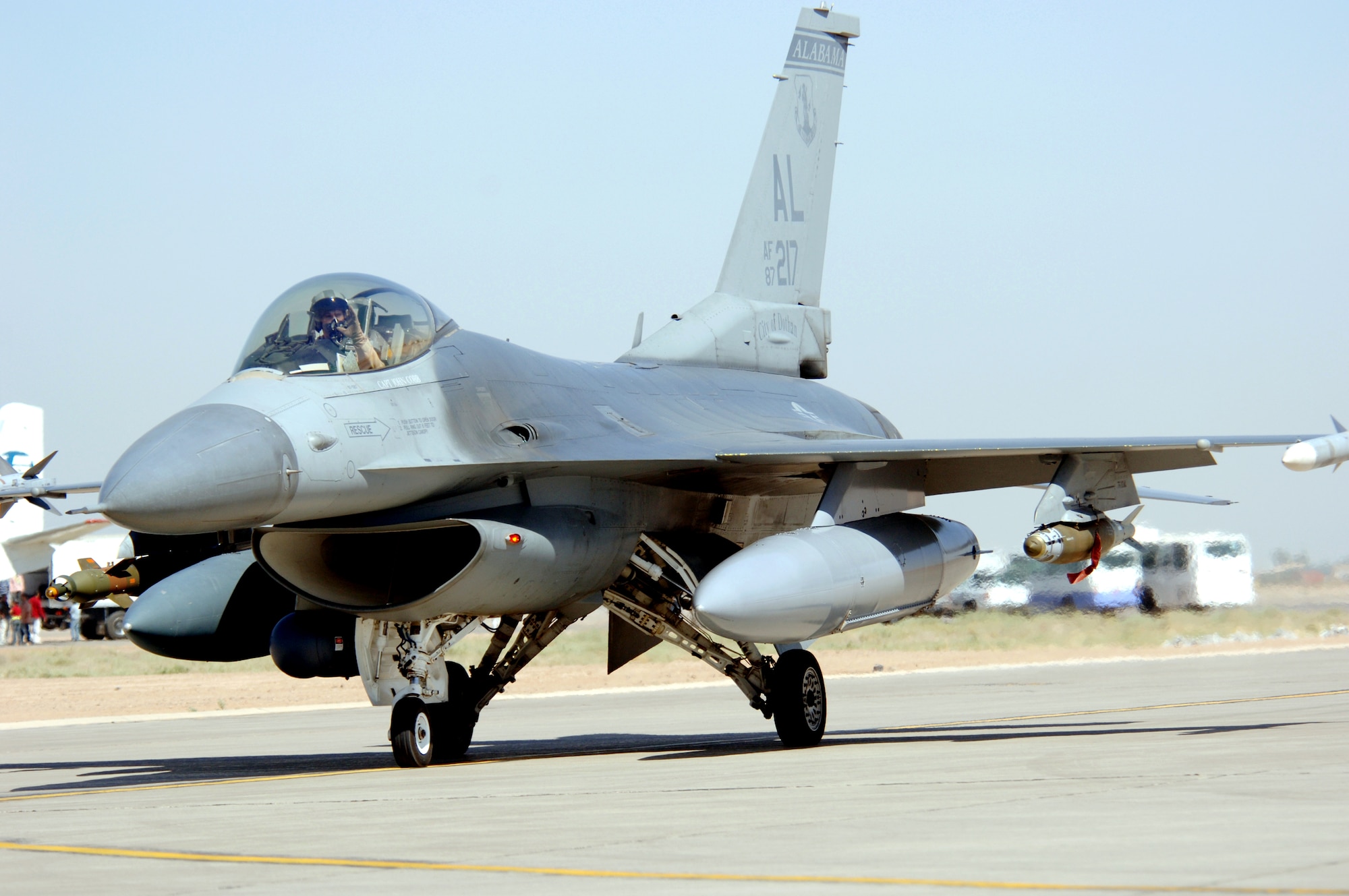 An F-16 Fighting Falcon taxis at Balad Air Base, Iraq, after an Operation Iraqi Freedom mission on Monday, June 12. The F-16 is deployed from the Alabama Air National Guard's 187th Fighter Wing in Montgomery. (U.S. Air Force photo/Staff Sgt. Tony R. Tolley) 
