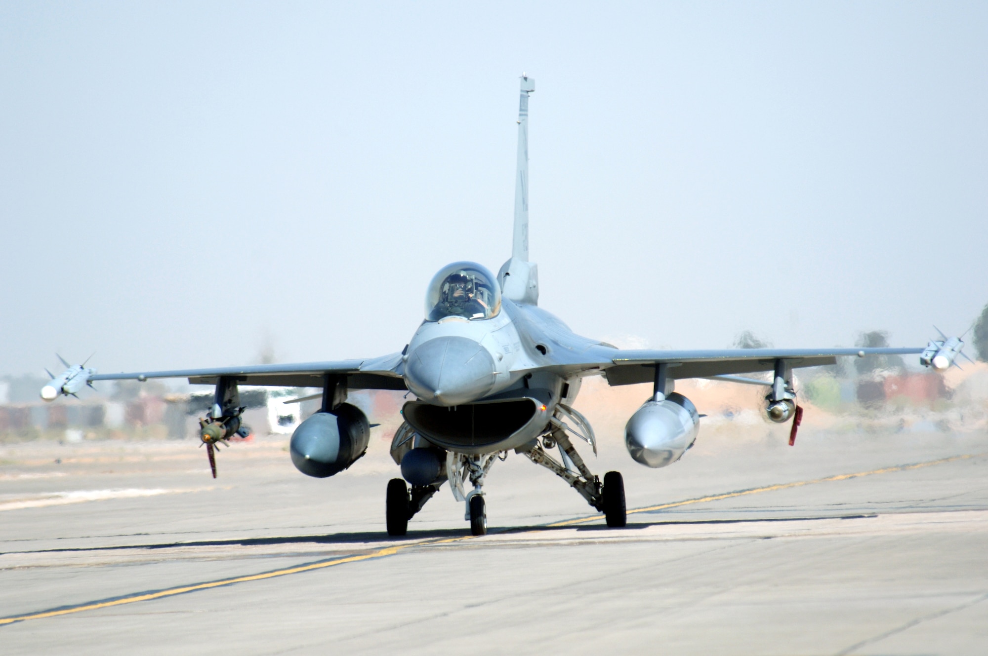 An F-16 Fighting Falcon taxis at Balad Air Base, Iraq, after an Operation Iraqi Freedom mission on Monday, June 12. The F-16 is deployed from the Alabama Air National Guard's 187th Fighter Wing in Montgomery. (U.S. Air Force photo/Staff Sgt. Tony R. Tolley) 
