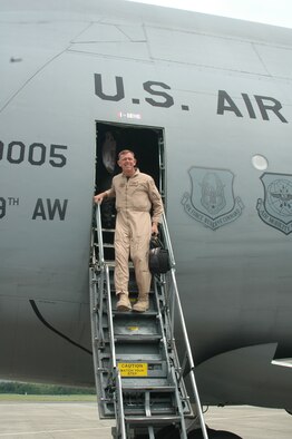 Brig. Gen. Wade Farris, 439th Airlift Wing commander, steps down from a Westover C-5 June 4 following his four-month deployment to a Southwest Asia location in support of Operation Iraqi Freedom. (U.S. Air Force photo/Tech Sgt. Andrew Biscoe)