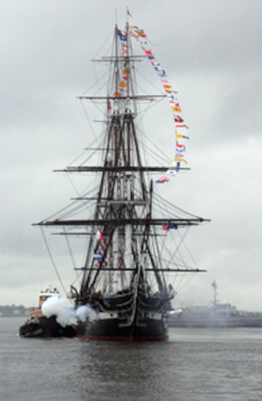 The USS Constitution fires a 21-gun salute to Castle Island's Fort Independence during its annual turn-around cruise in Boston Harbor, Mass., on June 10, 2006. USS Constitution, known as Old Ironsides, is the oldest commissioned ship in the world afloat. 