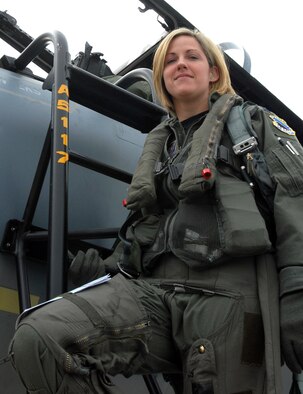 ELMENDORF AIR FORCE BASE, Alaska -- Capt. Samantha Weeks, 12th Fighter Squadron, enters her F-15C prior to a training mission here. Captain Weeks was one of three pilots recently selected to fly with the United States Air Force Thunderbirds. When she leaves Elmendorf, Captain Weeks will spend approximately two months at Luke Air Force Base, Ariz. for F-16 transition training before heading to Nellis AFB, Nev. (U.S. Air Force photo by Staff Sgt. Rhiannon Willard.)