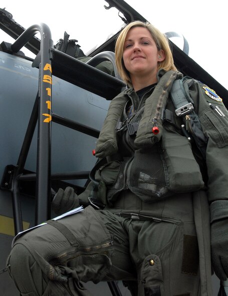 ELMENDORF AIR FORCE BASE, Alaska -- Capt. Samantha Weeks, 12th Fighter Squadron, enters her F-15C prior to a training mission here. Captain Weeks was one of three pilots recently selected to fly with the United States Air Force Thunderbirds. When she leaves Elmendorf, Captain Weeks will spend approximately two months at Luke Air Force Base, Ariz. for F-16 transition training before heading to Nellis AFB, Nev. (U.S. Air Force photo by Staff Sgt. Rhiannon Willard.)