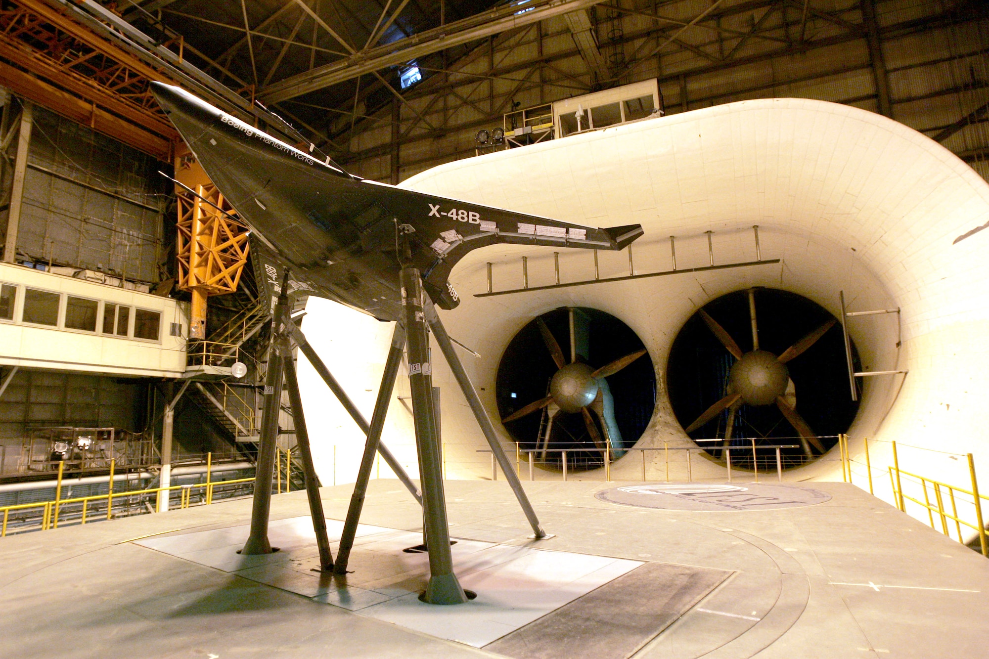 Researchers are testing a 21-foot wingspan prototype of the X-48B, a blended wing body aircraft, at the full scale wind tunnel at NASA's research center at Langley Air Force Base, Va. The Air Force Research Laboratory partnered with Boeing Phantom Works and the National Aeronautics and Space Administration to study the structural, aerodynamic and operational advantages of the advanced aircraft concept. (NASA photo/Jeff Caplan)