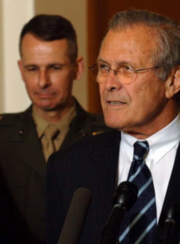 Secretary of Defense Donald H. Rumsfeld speaks to the press at the Cannon House Office Building in Washington, D.C., on June 13, 2006, after debriefing congressional intelligence members on meetings held by President Bush's interagency team on Iraq. The meetings, held at Camp David, Md., discussed plans to help Iraq's new government succeed after the death of terrorist leader Abu Musab al-Zarqawi and the formation of Iraqi Prime Minister Nouri al-Maliki's Cabinet. 