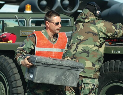 Tech. Sgt. Robert Slansky, 917th Aircraft Maintenance Squadron B-52 crew chief, gets prepared to back a B-52 into place on the ramp during RED FLAG - Alaska 06-2.  (Photo by Tech. Sgt. Jeff Walston)
