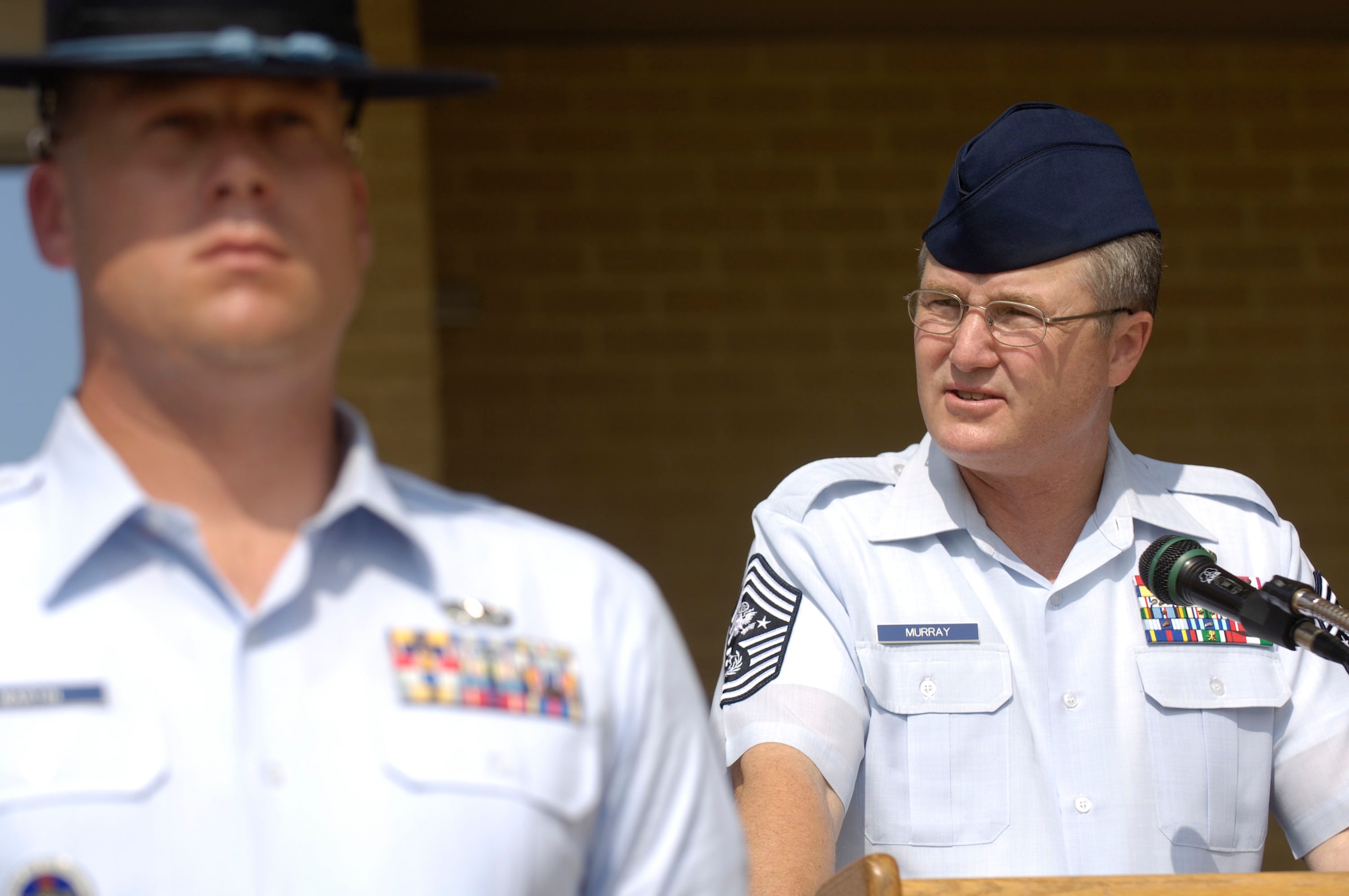 Chief Master Sergeant of the Air Force Gerald R. Murray speaks during a Basic Military Training Memorialization Ceremony at Lackland Air Force Base, Texas, on Wednesday, June 14. Chief Murray and several hundred people witnessed the ceremony that dedicated nine training facilities in honor of nine enlisted heroes who have served from World War II to present-day operations in the war on terrorism. The ceremony was part of a three-day event to honor the 60th anniversary of basic military training. (U.S. Air Force photo/Master Sgt. D. Scott Wagers)