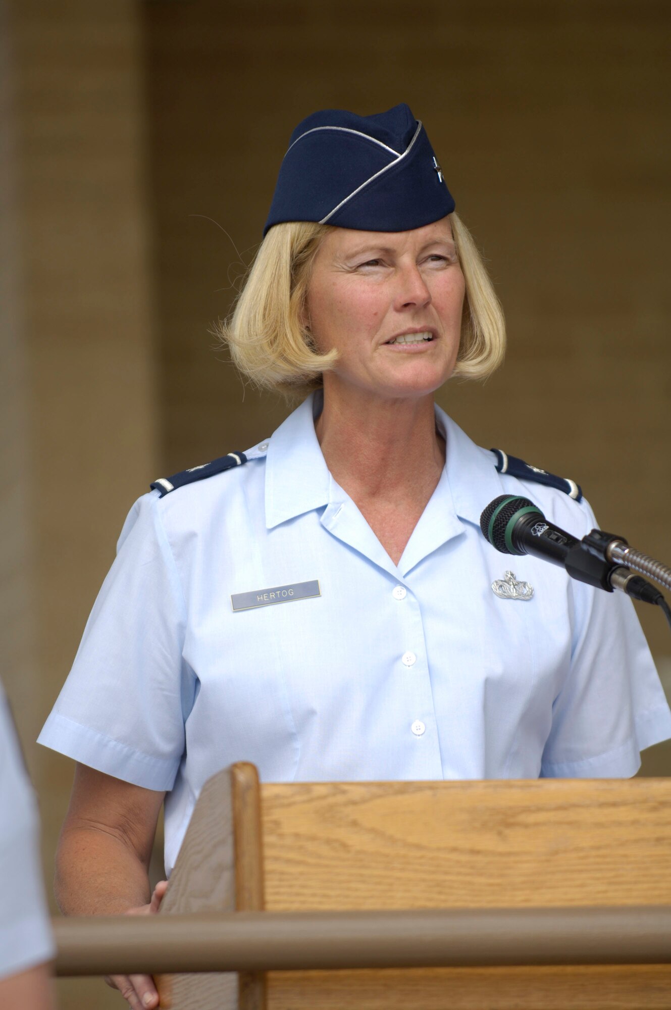 Brig. Gen. Mary K. Hertog speaks during a Basic Military Training Memorialization Ceremony on Lackland Air Force Base, Texas, on Wednesday, June 14. The 37th Training Wing commander and several hundred people witnessed the ceremony that dedicated nine training facilities in honor of nine enlisted heroes who have served from World War II to present-day operations in the war on terrorism. (U.S. Air Force photo/Master Sgt. D. Scott Wagers)
