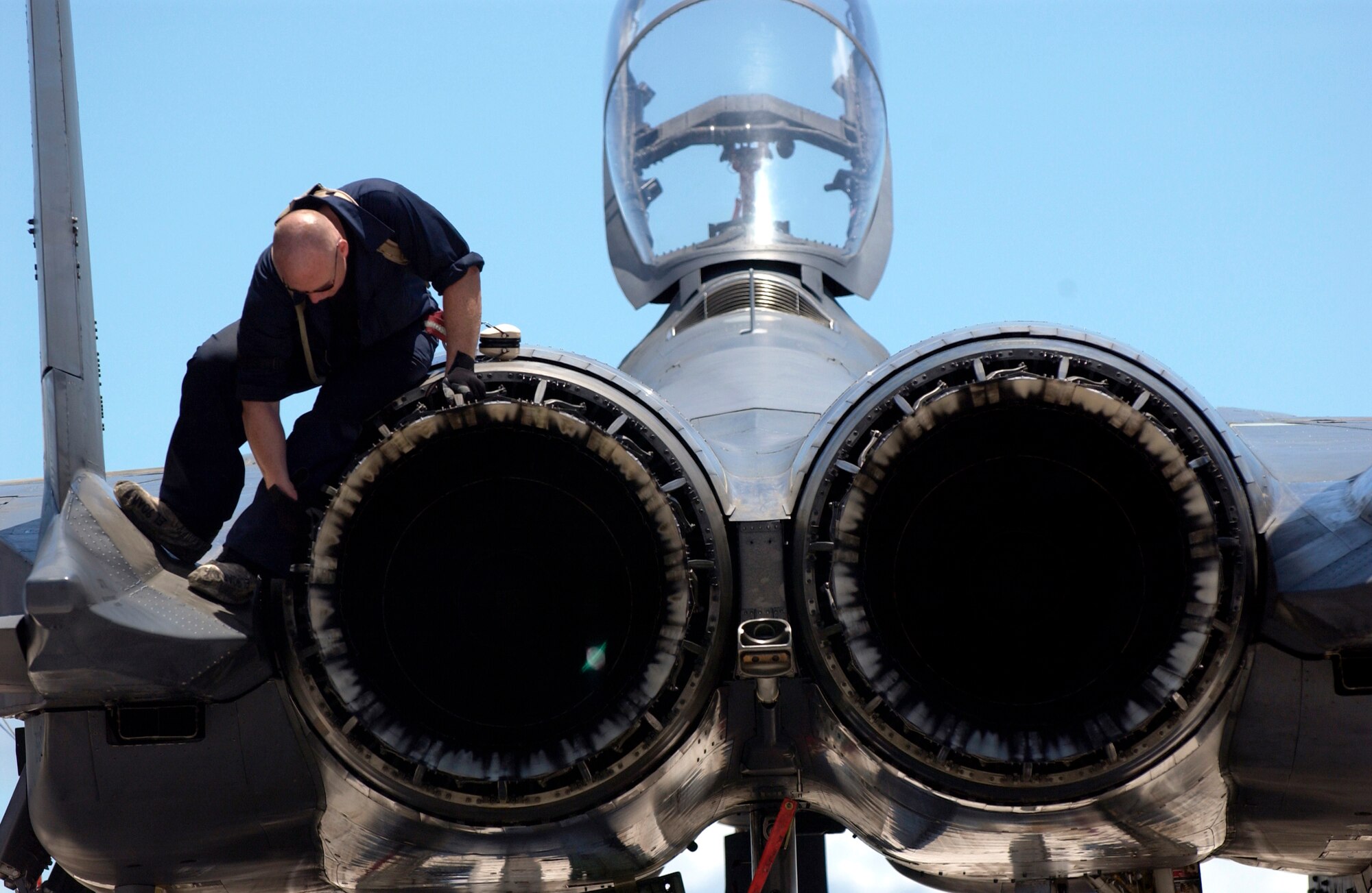 Senior Airman Casey Rietdyk checks an F-15E Strike Eagle for airframe damage after a training sortie at Andersen Air Force Base, Guam, on June 5. The Strike Eagles are here through September as part of an air expeditionary deployment. Airman Rietdyk is assigned to the 36th Expeditionary Aircraft Maintenance Squadron. (U.S. Air Force photo/Airman 1st Class Michael S. Dorus)