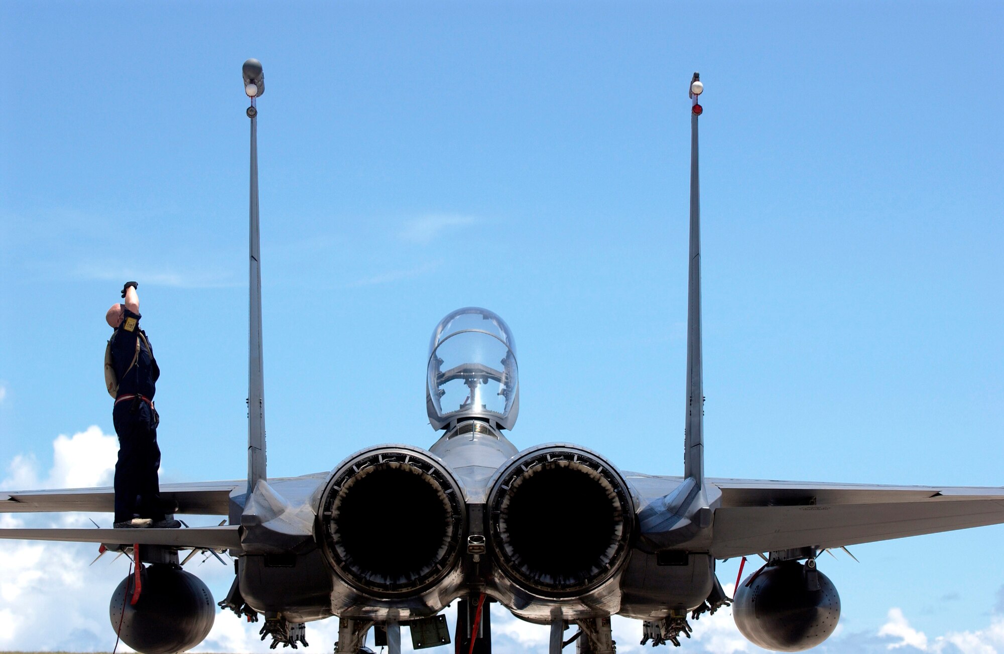 Senior Airman Casey Rietdyk checks an F-15E Strike Eagle for airframe damage after a training sortie at Andersen Air Force Base, Guam, on June 5. The Strike Eagles are here through September as part of an air expeditionary deployment. Airman Rietdyk is assigned to the 36th Expeditionary Aircraft Maintenance Squadron. (U.S. Air Force photo/Airman 1st Class Michael S. Dorus)