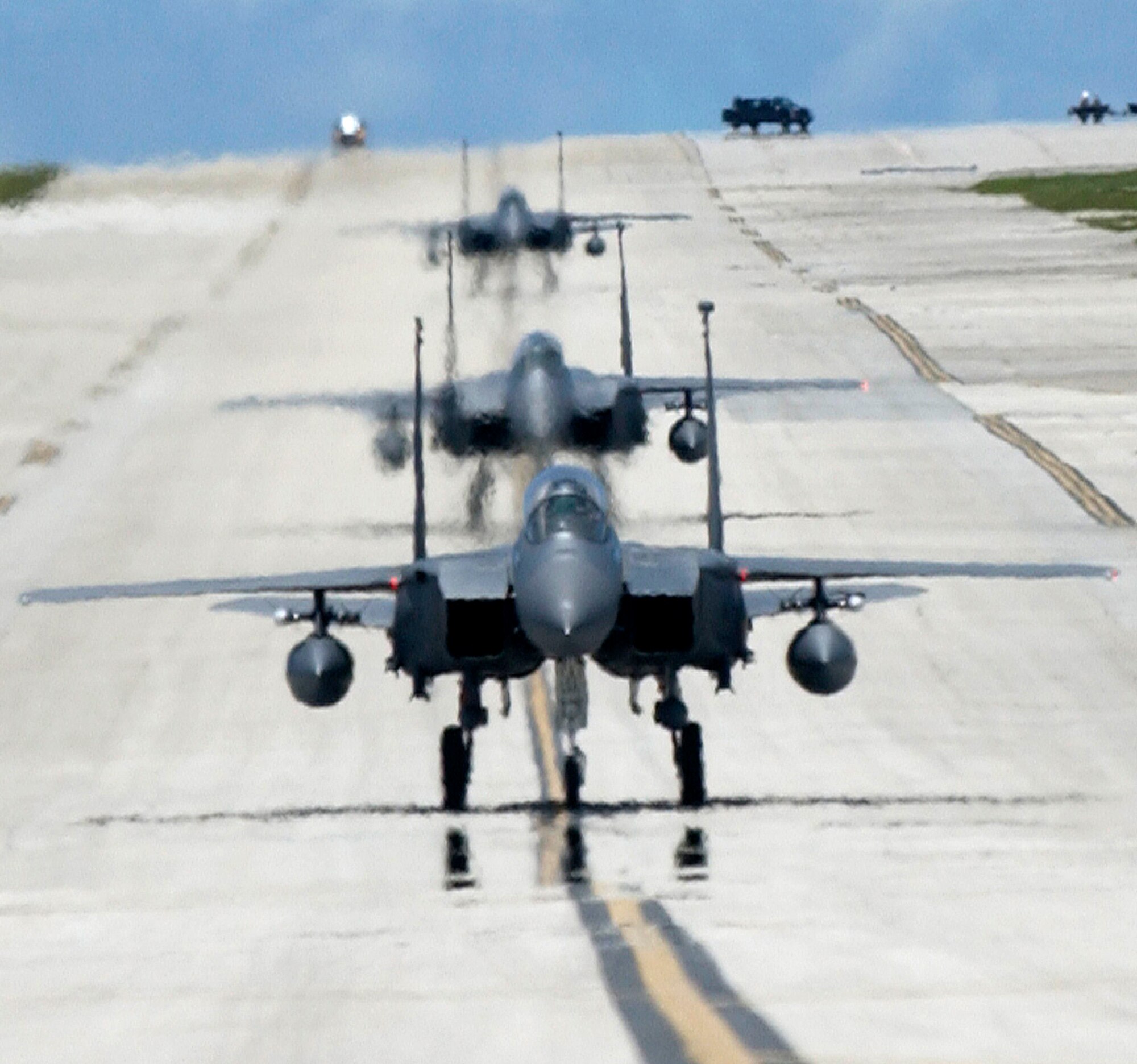F-15E Strike Eagles taxi at Andersen Air Force Base, Guam, after a training sortie on Monday, June 5. The Strike Eagles are here through September as part of an air expeditionary deployment. (U.S. Air Force photo/Airman 1st Class Michael S. Dorus)