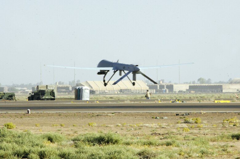 An MQ-1 Predator unmanned aerial vehicle takes off from Balad Air Base, Iraq, on Wednesday, June 14. The Predator can employ two laser-guided Hellfire anti-tank missiles. (U.S. Air Force photo/Airman 1st Class Andrew Oquendo) 