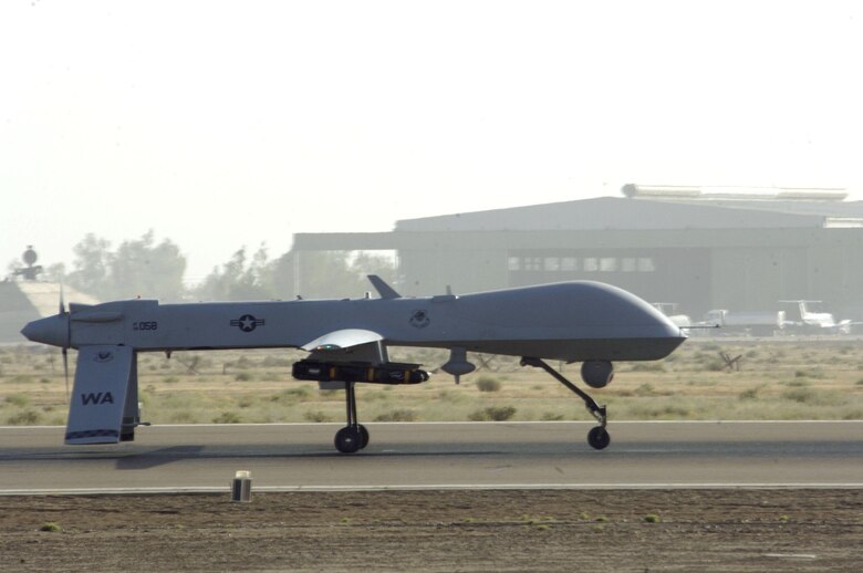 An MQ-1 Predator unmanned aerial vehicle taxis down the runway at Balad Air Base, Iraq, on Wednesday, June 14. The Predator can employ two laser-guided Hellfire anti-tank missiles. (U.S. Air Force photo/Airman 1st Class Andrew Oquendo) 