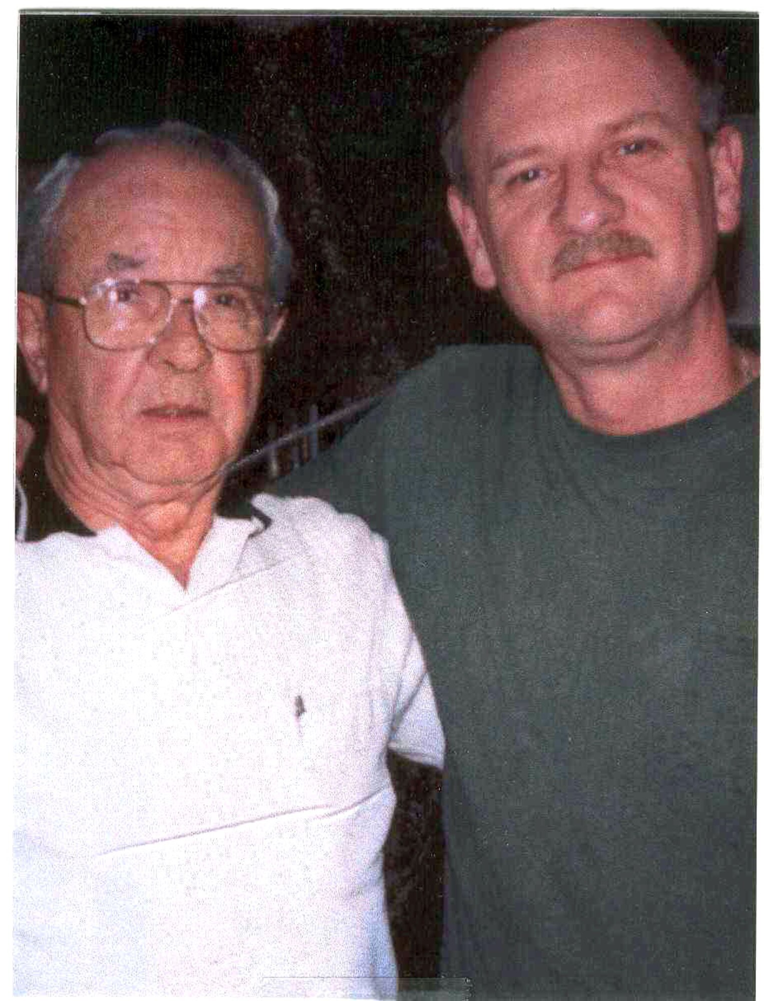 Troy Curnutte, right, said his father, retired Lt. Col. Bill Curnutte, was his best friend and role model. When the senior Curnutte died in 2003, his son worked to get his father a Distinguished Flying Cross for his heroic actions during a January 1969 rescue mission over Laos. (Courtesy photo/Troy Curnutte)