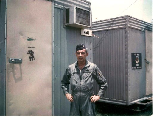 Lt. Col. Bill Curnutte paused for a quick photograph outside the trailer where he lived at Da Nang Air Base, South Vietnam, before taking off for a combat mission. Troy Curnutte, the colonel's son, lobbied the Air Force to present his father a Distinguished Flying Cross for his heroic actions during a January 1969 rescue mission over Laos. (Courtesy photo/Troy Curnutte) 