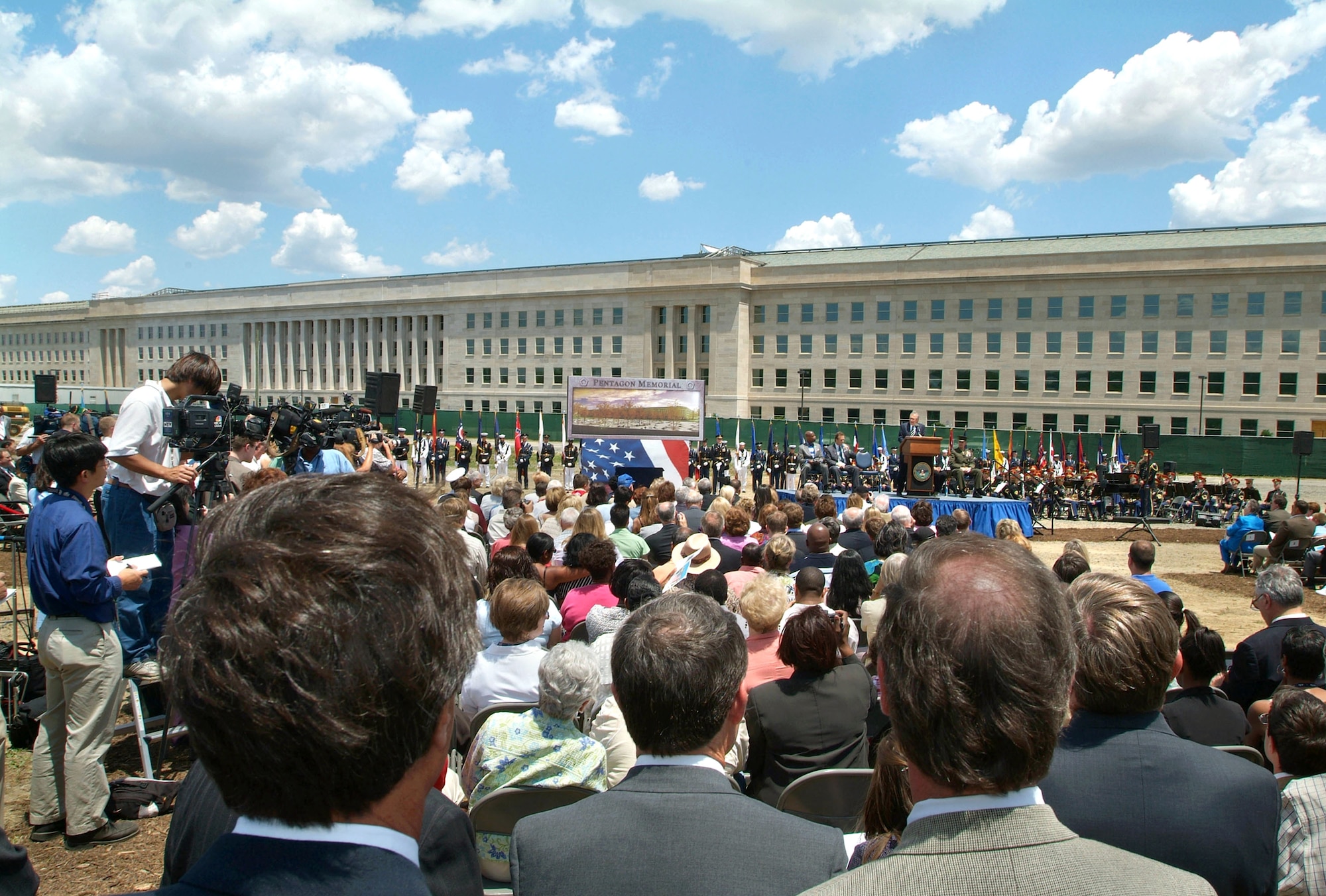 Secretary of Defense Donald H. Rumsfeld speaks at the Pentagon Memorial groundbreaking ceremony on Thursday, June 15. The memorial, tentatively scheduled for completion in September 2008, is dedicated in memory of the 184 lives lost when American Airlines Flight 77 crashed into the Pentagon on Sept. 11, 2001. (U.S. Navy photo/Chief Photographer's Mate Johnny Bivera)
