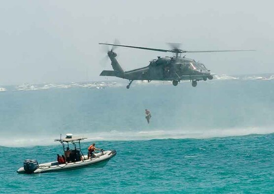 Rescue forces from the 920th Rescue Wing demonstrated to the crowd of four million at the Florida Air and Sea Show in Ft. Lauderdale how pararescumen and aircraft crews pull together to rescue downed Airmen out of combat situations.                    
