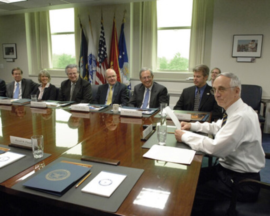 Deputy Secretary of Defense Gordon England (right) addresses the Board of Directors Executive Committee of the National Association of Manufacturers at the Pentagon on June 14, 2006. England held a question and answer period to better facilitate communications with the manufacturing community and employers of Guard and Reserve service members. 
