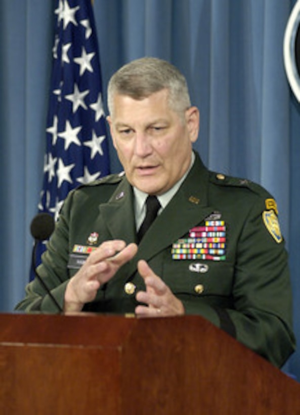 Joint Staff Deputy Director for Regional Operations Brig. Gen. Carter Ham, U.S. Army, discusses the current situation in Afghanistan and Iraq with representatives of the news media during a Pentagon press briefing on June 14, 2006. 