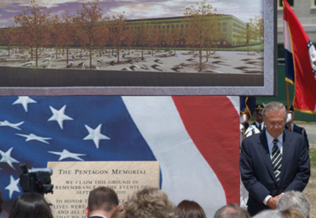 Secretary of Defense Donald H. Rumsfeld bows his head during the benediction at the groundbreaking ceremonies for the Pentagon Memorial on June 15, 2006. The Pentagon Memorial will commemorate the 184 people killed in the Pentagon and on American Airlines Flight 77 on September 11, 2001. 