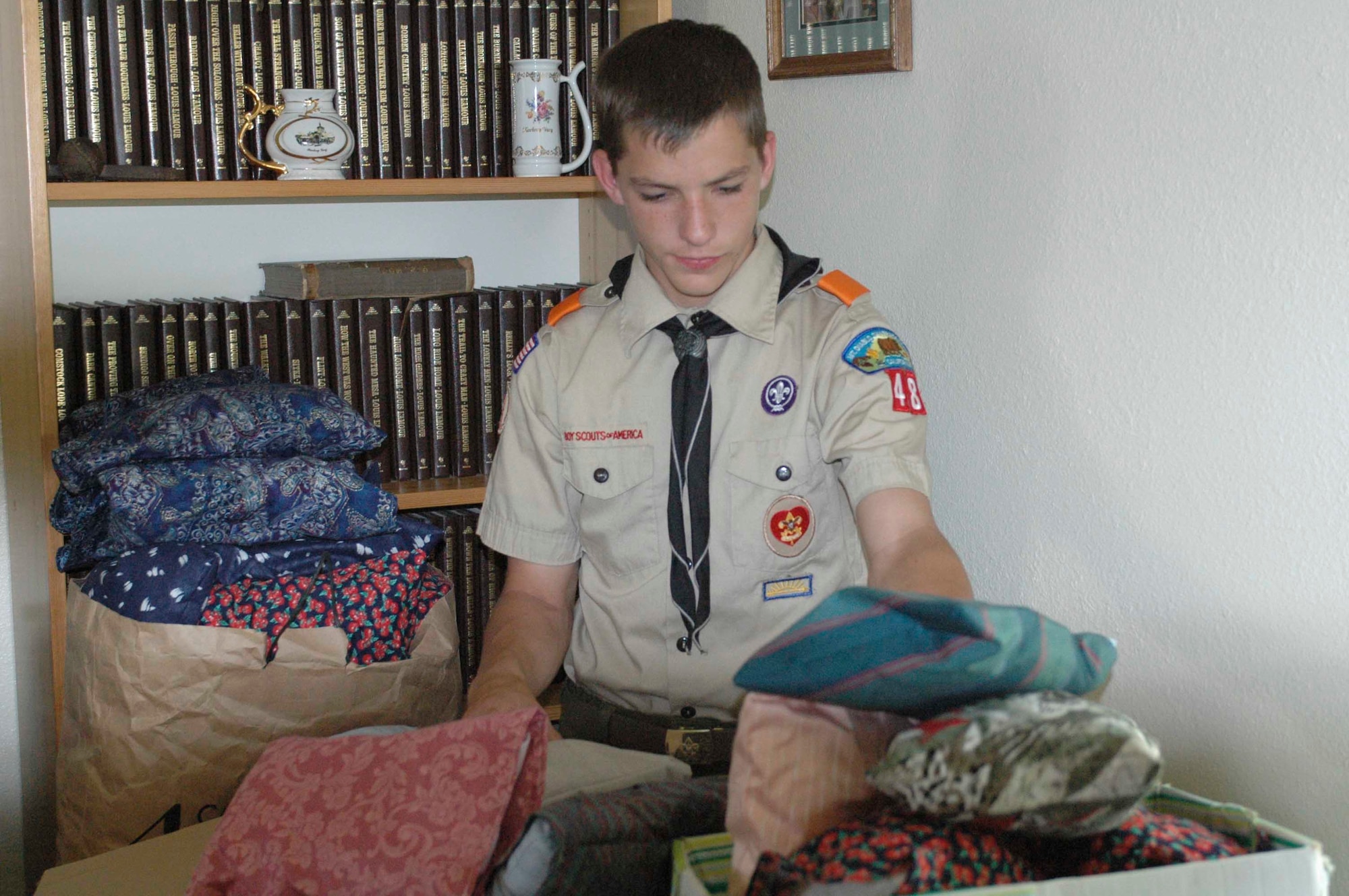 David Young, son of Master Sgt. Ron Young, 573rd Global Support Squadron, made comfort pillows for women to use after mastectomies. The pillows were delivered to David Grant USAF Medical Center and the American Cancer Society headquarters in San Francisco to be distributed throughout the bay area. (U.S. Air Force photo by Jennifer Brugman)