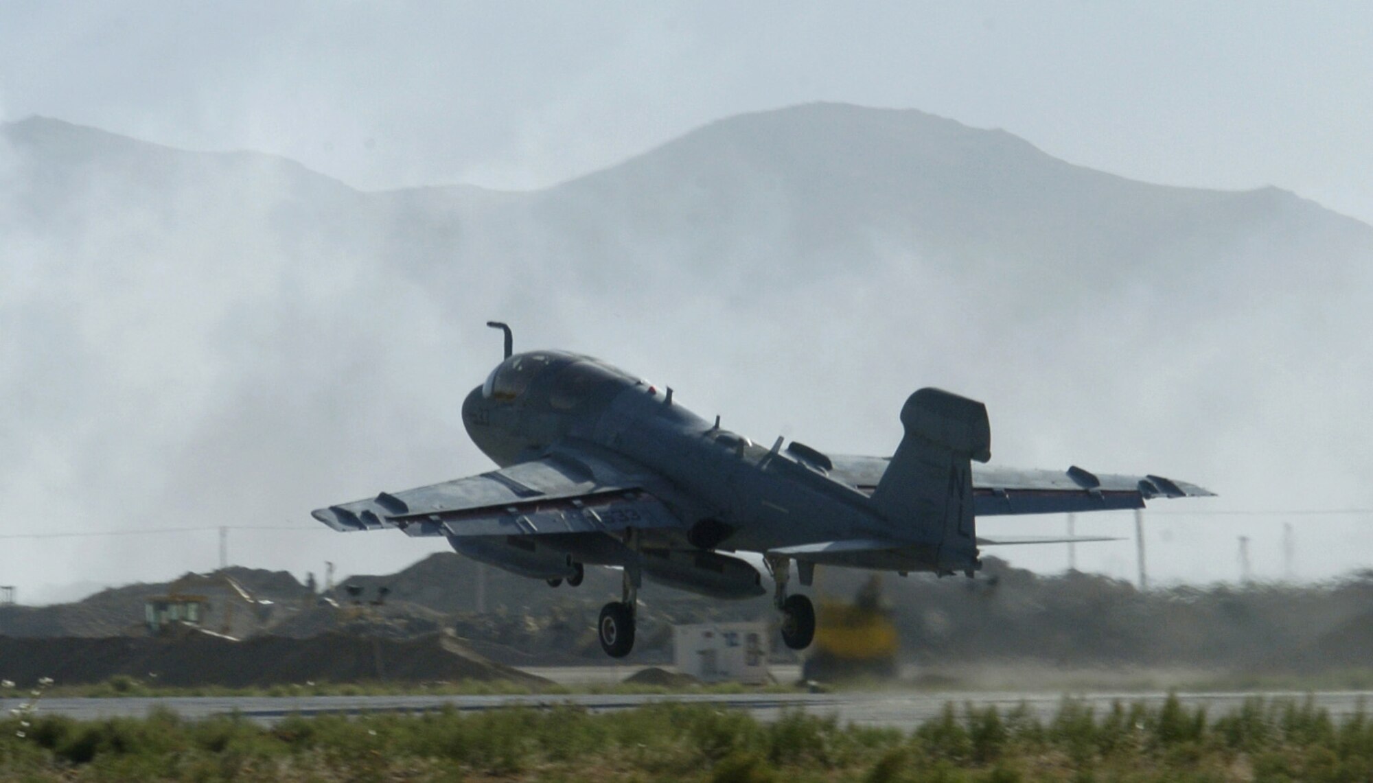 A Navy EA-6B Prowler takes off from Bagram Air Base, Afghanistan, on Thursday, June 15. Air Force and Navy crewmembers here fly the Prowler, providing support to ground troops in Afghanistan. (U.S. Air Force photo/Senior Airman Brian Ferguson)
