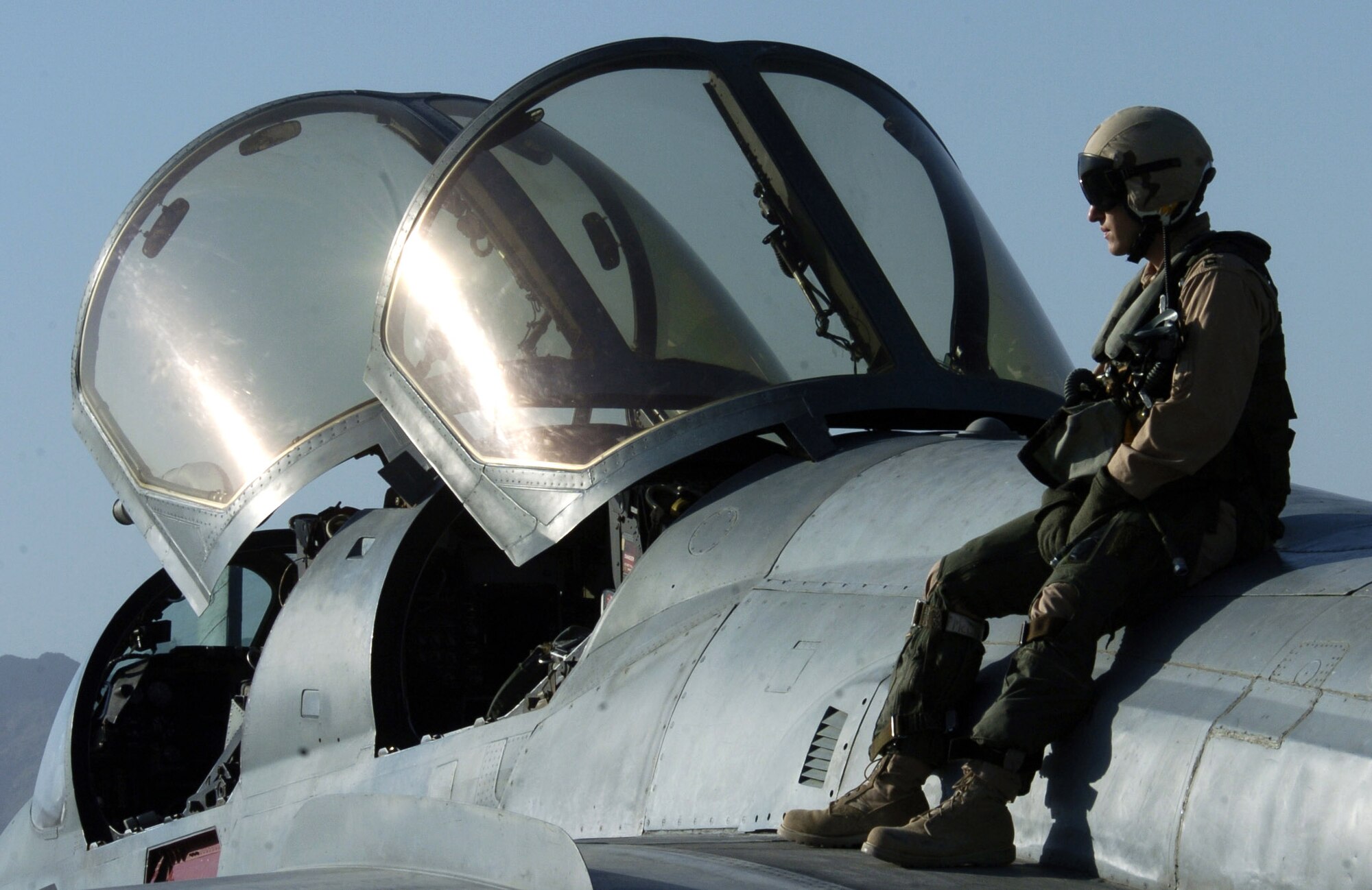 Air Force Capt. Matthew Polus sits on a Navy EA-6B Prowler before takeoff from Bagram Air Base, Afghanistan, on Thursday, June 15. Captain Polus is an electronic countermeasures officer with the Electronic Attack Squadron 133 Wizards. Air Force and Navy crewmembers fly the Prowler, providing support to ground troops in Afghanistan. (U.S. Air Force photo/Senior Airman Brian Ferguson)