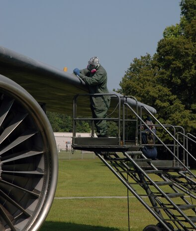 Members of the 315th Maintenance Squadron, Charleston AFB, S.C. preps the C-141 Starlifter residing in Heritage Park for a new paint job. The new paint job will reflect the historical paint scheme of the final C-141 that recently retired during a ceremony at Wright-Patterson Air Force Base, Ohio. (Photo by 1st Lt. Wayne Capps, USAFR)