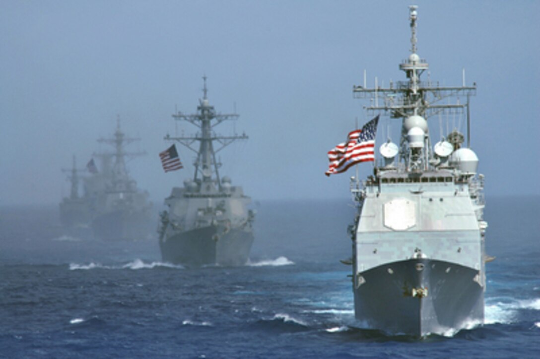 The USS Cowpens (CG 63) leads the formation of USS Lassen (DDG 82), USS John S. McCain (DDG 56), USS Vandegrift (FFG 48) and USNS Tippecanoe (T-AO 199) in the Western Pacific Ocean on June 18, 2006, to start exercise Valiant Shield 2006. The joint exercise consists of 28 naval vessels including three carrier strike groups and more than 300 aircraft and approximately 20,000 service members from the Navy, Army, Air Force, Marine Corps and Coast. 