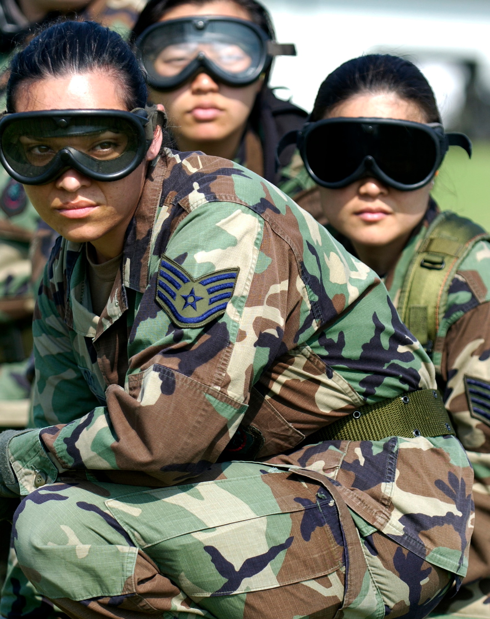 Airmen stand at the ready to move patients from arriving helicopters June 17 at the mobile aeromedical staging facility. Patients and equipment are eventually moved to Air Force C-130 and C-17 aircraft which transport them to the contingency aeromedical staging facility at Augusta Regional Airport at Busch Field, Ga., one of the locations of Golden Medic 2006, an annual training medical exercise.  (U.S. Air Force photo/Staff Sgt. Stephen Schester)