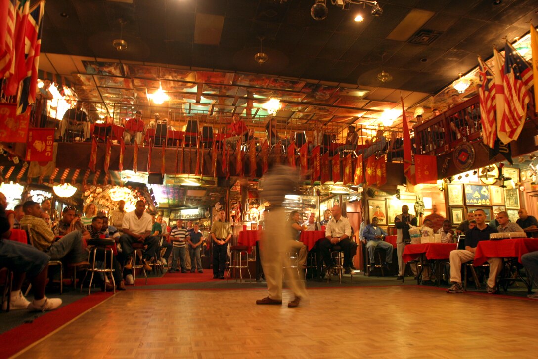 JACKSONVILLE, N.C. (June 21, 2006) ? Sgt. Maj. Carl R. Green shares his knowledge and experience to a group of Combat Logistic Battalion 2 Marine noncommissioned officers during an NCO appreciation night at Sywanyks Scarlet and Gold Traditions nightclub. Green is the 2nd Marine Logistics sergeant major.