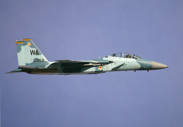 An F-15 shows off its new Aggressor paint scheme over Nellis Air Force Base, Nev. The 65th Aggressor Squadron, which flies the F-15, stood up earlier this year. The 64th Aggressor Squadron, also at Nellis, flies F-16 Aggressor aircraft. Both squadrons prepare combat air force joint and allied aircrews for tomorrow’s victories through challenging, realistic threat replication, training, test support, academics and feedback. (Photo courtesy Paul Ridgway, Typhire Photography)