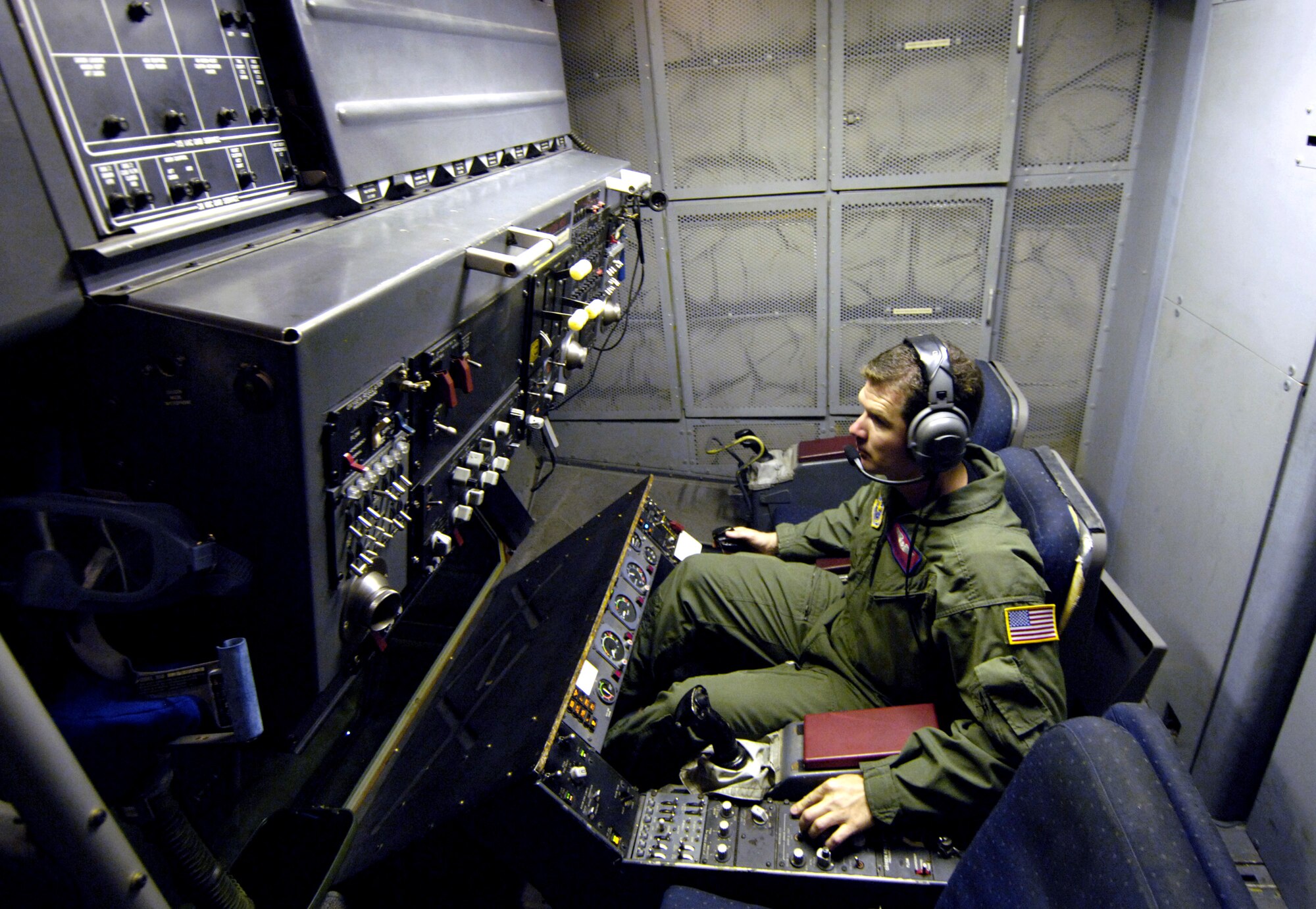 Staff Sgt. Michael Hinton performs a preflight check on the refueling controls of a KC-10 Extender at Andersen Air Force Base, Guam, on Wednesday, June 21, during Exercise Valiant Shield. The joint exercise includes more than 300 aircraft, 28 naval vessels and approximately 20,000 service members. Sergeant Hinton is a boom operator with the 9th Air Refueling Squadron at Travis AFB, Calif. (U.S. Air Force photo/Tech. Sgt. Shane A. Cuomo) 