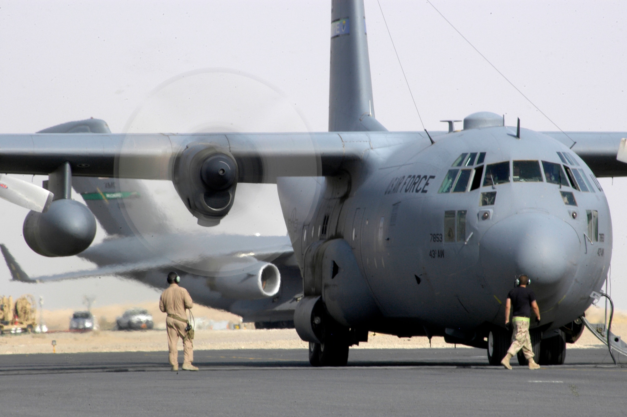 Aircrew and maintainers go over final pre-flight checks on a C-130 Hercules before a mission at a deployed location in Southwest Asia on Tuesday, June 20. The Airmen are with the 386th Air Expeditionary Wing. (U.S. Air Force photo/Staff Sgt. Ryan Hansen)