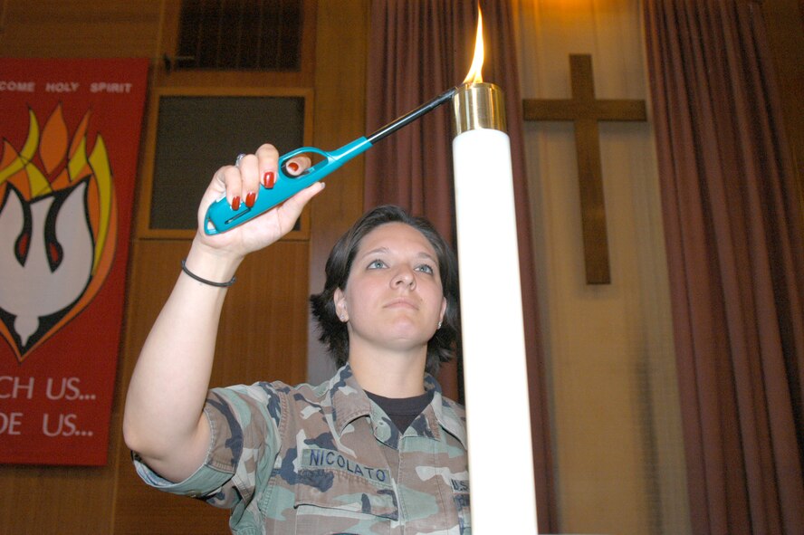 Senior Airman Crystal Nicolato, 7th Bomb Wing chaplain?s assistant, preps an altar for a service. Airman Nicolato is responsiblefor assisting the chaplain?s office mission, to support Airmen spiritually and morally.                                