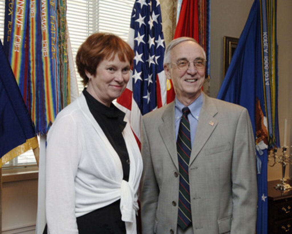 Deputy Secretary of Defense Gordon England (right) poses for photographs with Swedish Minister of Defense Leni Bjorklund (left) prior to their meeting in the Pentagon on June 20, 2006. England and Bjorklund are meeting to discuss defense issues of mutual interest. 