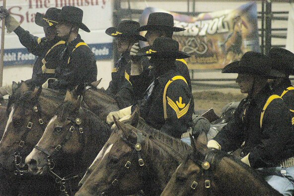 Members of the 1st Cavalry Division, Horse Cavalry Detachment, perform a show for Abilene residents June 16.                                