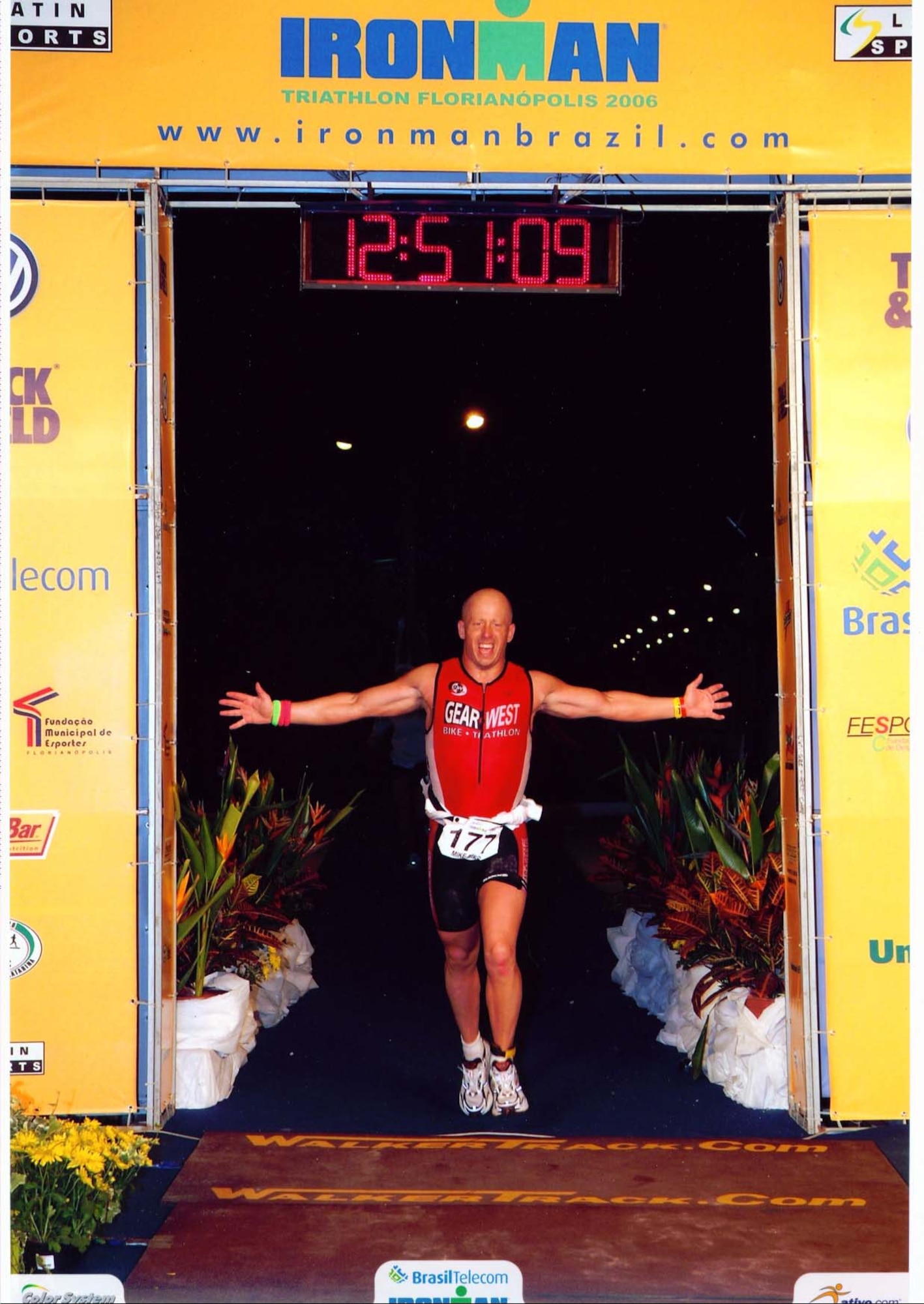 Mike Bier crosses the finish line at Ironman Brazil after almost 13 hours of swimming, cycling and running.