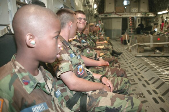 Members of the South Carolina Civil AIr Patrol deplane after an orientation flight on a C-17 at Shaw Wednesday.  The CAP was established in 1941 and provides vital support of aerial and ground search and rescue, disaster relief, communications support, counterdrug and homeland security missions.  (U.S. Air Force Photo/Senior Airman John Gordinier)