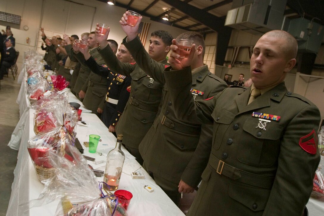 Purple Heart recipients toast the warriors of World War II, Korea, Vietnam, Somalia, Operations Desert Storm, Iraqi and Enduring Freedom and the memory of those who have been either killed or missing in action or endured the trials of life as a prisoner of war during a banquet held at Jacksonville?s American Legion Post 265 Hall June 24 held in honor of Purple Heart recipients.