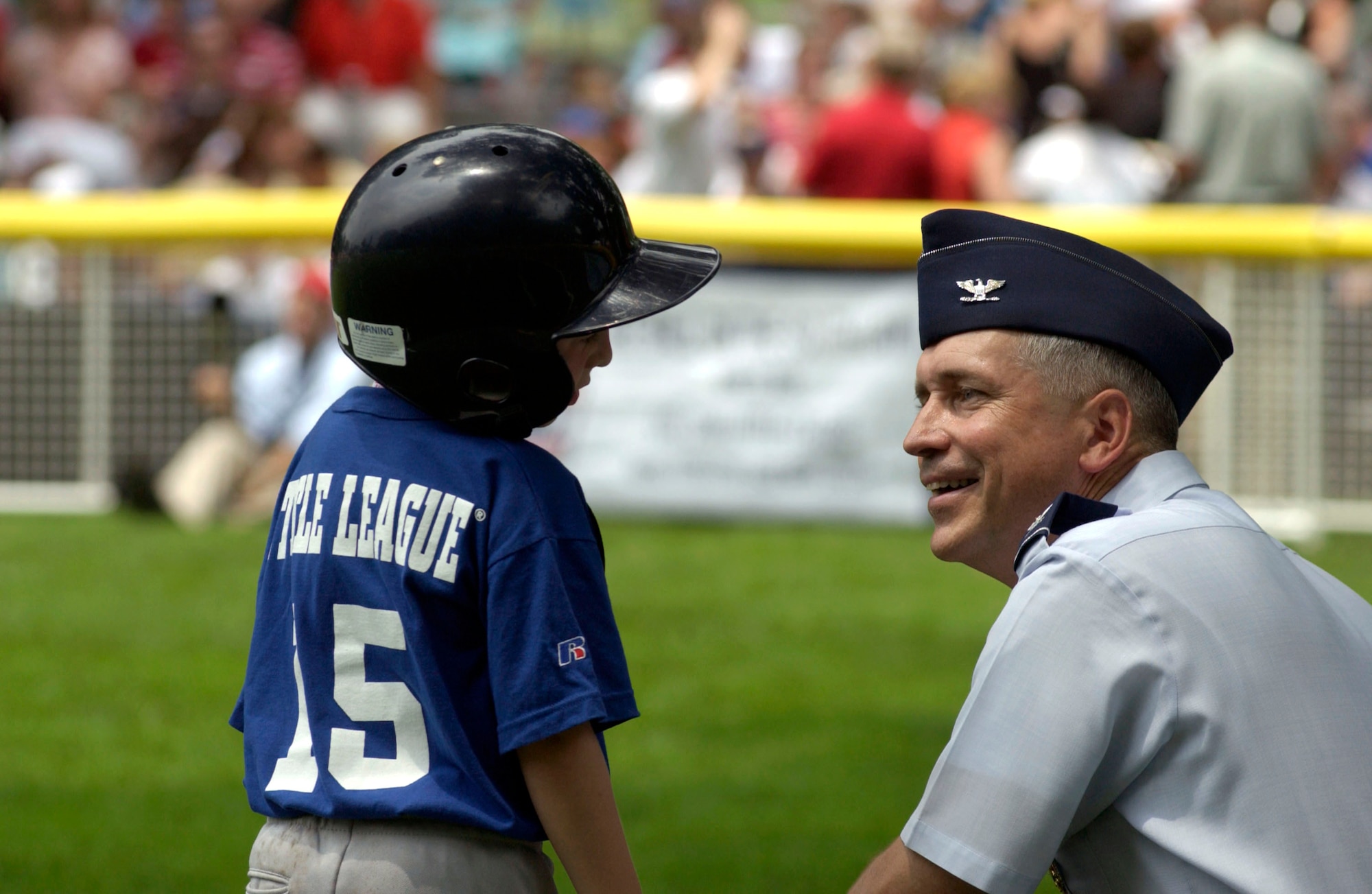 Col. Frederick Martin talks with Jakob Pohlman of the Dolcom Little League Indians at third base during a game on the South Lawn of the White House on Friday, June 23, marking the official start of the Little League season.  Colonel Martin, assigned at McGuire Air Force Base, N.J., served as the third base coach for both the Indians from Naval Submarine Base New London in Groton, Conn., and the Yankees from McGuire. (U.S. Air Force photo/Tech. Sgt. Cohen A. Young) 