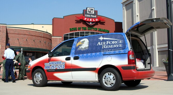 Air Force Reserve recruiters and members from the 445th Aeromedical Evacuation Squadron set-up displays in front of 5/3 Baseball Field in downtown Dayton, Ohio for visitors coming to the ballpark to check out Reserve possibilities. (U.S. Air Force Reserve Photo by Maj. Ted Theopolos)