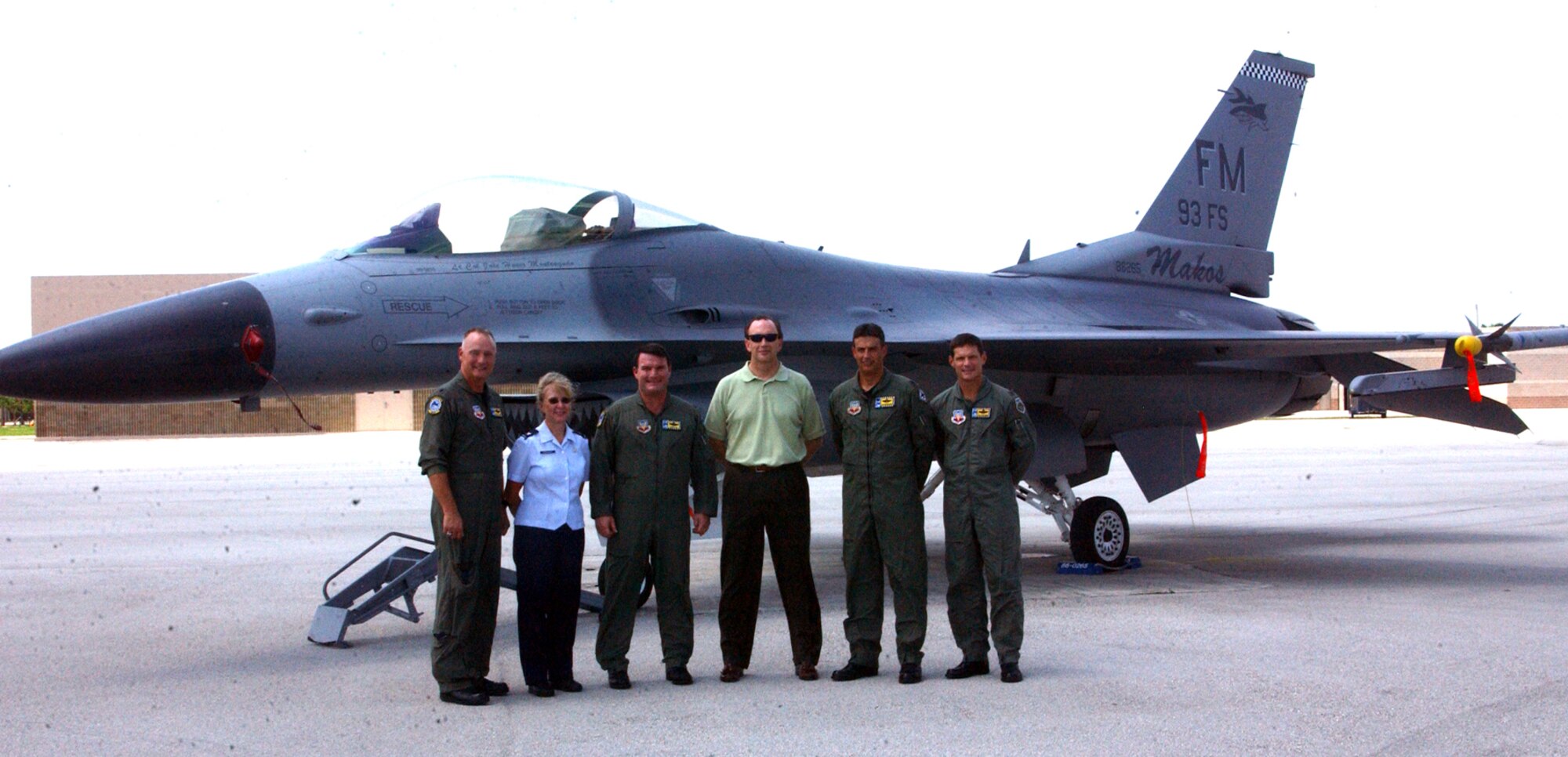 William C. Anderson (center), Assistant Secretary of the Air Force for Installations, Environment and Logistics, visited Homestead Air Reserve Base, Fla., 26-27 June.  His stay included visits to all major areas of the base and roundtable discussions with Airmen from various squadrons (Air Force photo by Lisa Macias).