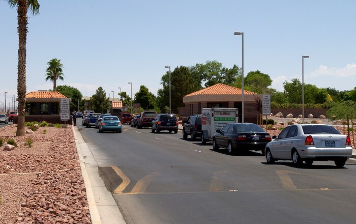 Cars line up at the Nellis Air Force Base main gate as they undergo security checks. Nellis AFB, the “Home of the Fighter Pilot,” is located about 8 miles northeast of Las Vegas, Nev. (U.S. Air Force photo)
