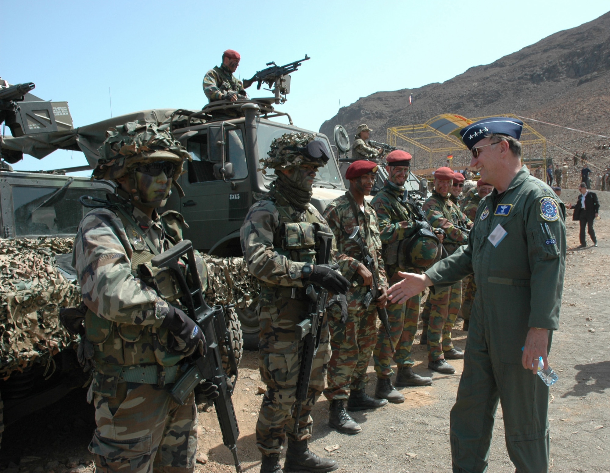 SAO VICENTE, Cape Verde -- General Tom Hobbins, Allied Air Component Command Ramstein commander and U.S. Air Forces in Europe commander, congratulates NATO troops during NATO's Exercise Steadfast Jaguar June 23.  The purpose of the live exercise is to test NATO Response Force-7's ability to project a force at a strategic distance from mainland Europe and sustain it.  More than 7,000 NATO personnel from land, maritime and air components trained together as a multinational joint force from June 15-28.  (U.S. Air Force Photo by Capt. Krista Carlos)