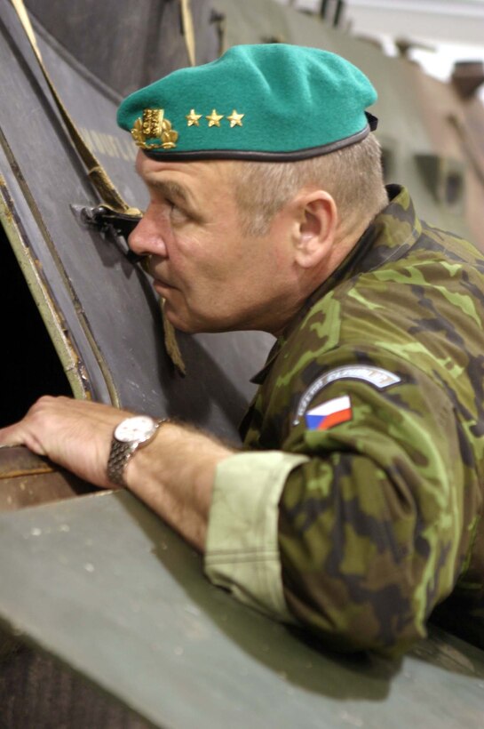 MARINE CORPS BASE CAMP LEJEUNE, N.C. (June 28, 2006) ? Lieutenant Gen. Jaroslav Kolkus looks into a landing assault vehicle, June 28. During Kolkus?s stay, he was introduced to various aspects of Marine Corps ground assault and logistics. Kolkus is the 1st Deputy Chief of General Staff of the Czech Republic.