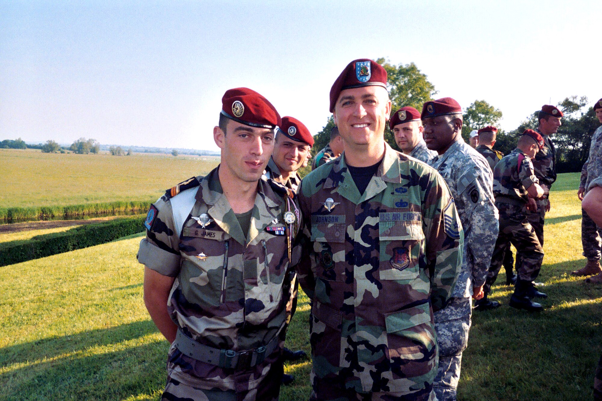 Master Sgt. Andrew Johnson stops for a photo with a French paratrooper during his visit to Normandy, France, on June 5. Sergeant Johnson was the only U.S. Air Force member participating as a paratrooper in the 62nd anniversary of the D-Day invasion of June 6, 1944. Sergeant Johnson is a contingency skills instructor at the 421st Combat Training Squadron at Fort Dix, N.J. (U.S. Air Force photo)