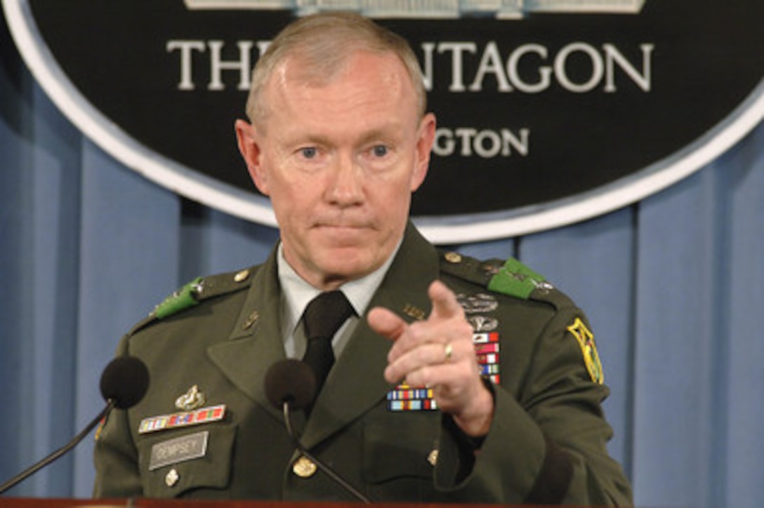 Commander of the Multi-national Security Transition Command in Iraq Lt. Gen. Martin Dempsey, U.S. Army, updates reporters on the transition of Iraqi forces assuming the duties and responsibilities which U.S. forces are currently providing during a Pentagon press conference on June 27, 2006. 