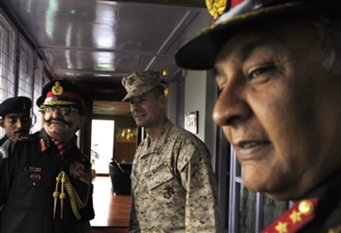 Indian Army Training Command Commander Lt. Gen. Kuldip Jamwal shows Chairman of the Joint Chiefs of Staff U.S. Marine Gen. Peter Pace the facilities of the Army Indian Training headquarters in Shimla, India, June 6, 2006.