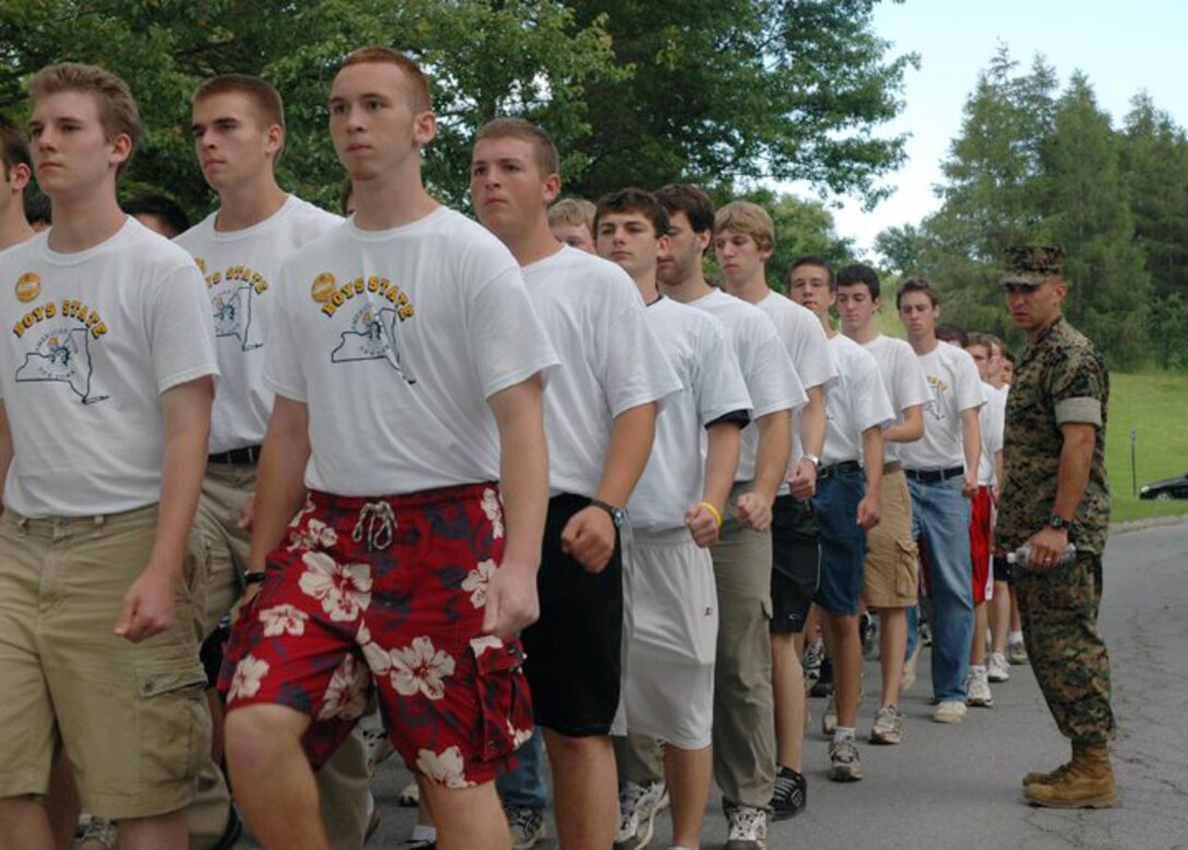 Staff Sgt. Alexander Vivas looks to see that the students under his charge are staying in step to the cadence he is calling. Vivas, was one of 12 Marines who participated in this years annual New York American Legion Boys' State. The Marines filled a mentor role, teaching the participants everything from close order drill to discipline.